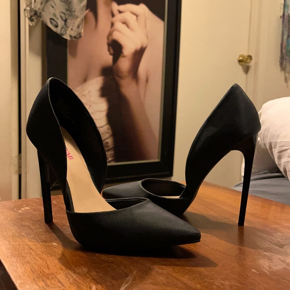 Black stiletto pumps.